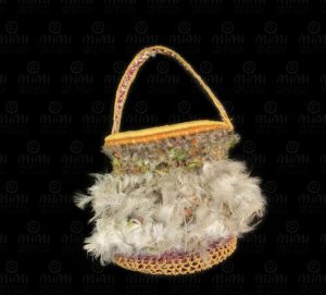 Netted pandanus basket with feathers by Dorothy Dullman Bienanwangu